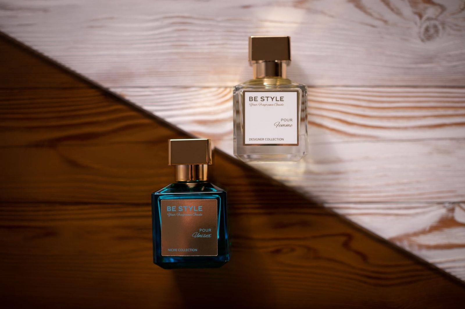 Stylish perfume bottles displayed on a textured wooden background for a modern look. (photographie d’illustration)